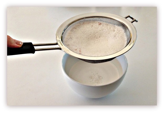 Almond Milk Passing Through Stainless Mesh Strainer from HIC Harold Import Co. Almond Milk Passing Through Stainless Mesh Strainer