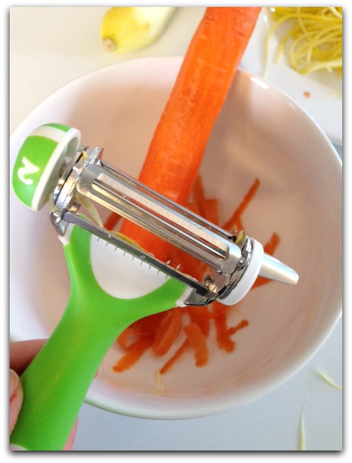 The World's Greatest 3-in-1 Rotational Tri-Blade Peeler Removing Carrot Skin